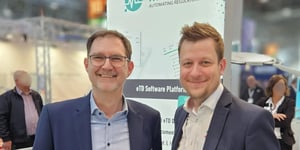 Metecon CEO Alexander Fink (left) and meddevo CEO Michael M. Kania standing side by side, representing their partnership for digital technical documentation.