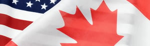Nahaufnahme der Flaggen von Kanada und den USA als Symbol für nordamerikanische Handelsbeziehungen, internationale Zusammenarbeit und regulatorische Anforderungen im grenzüberschreitenden Markt.
